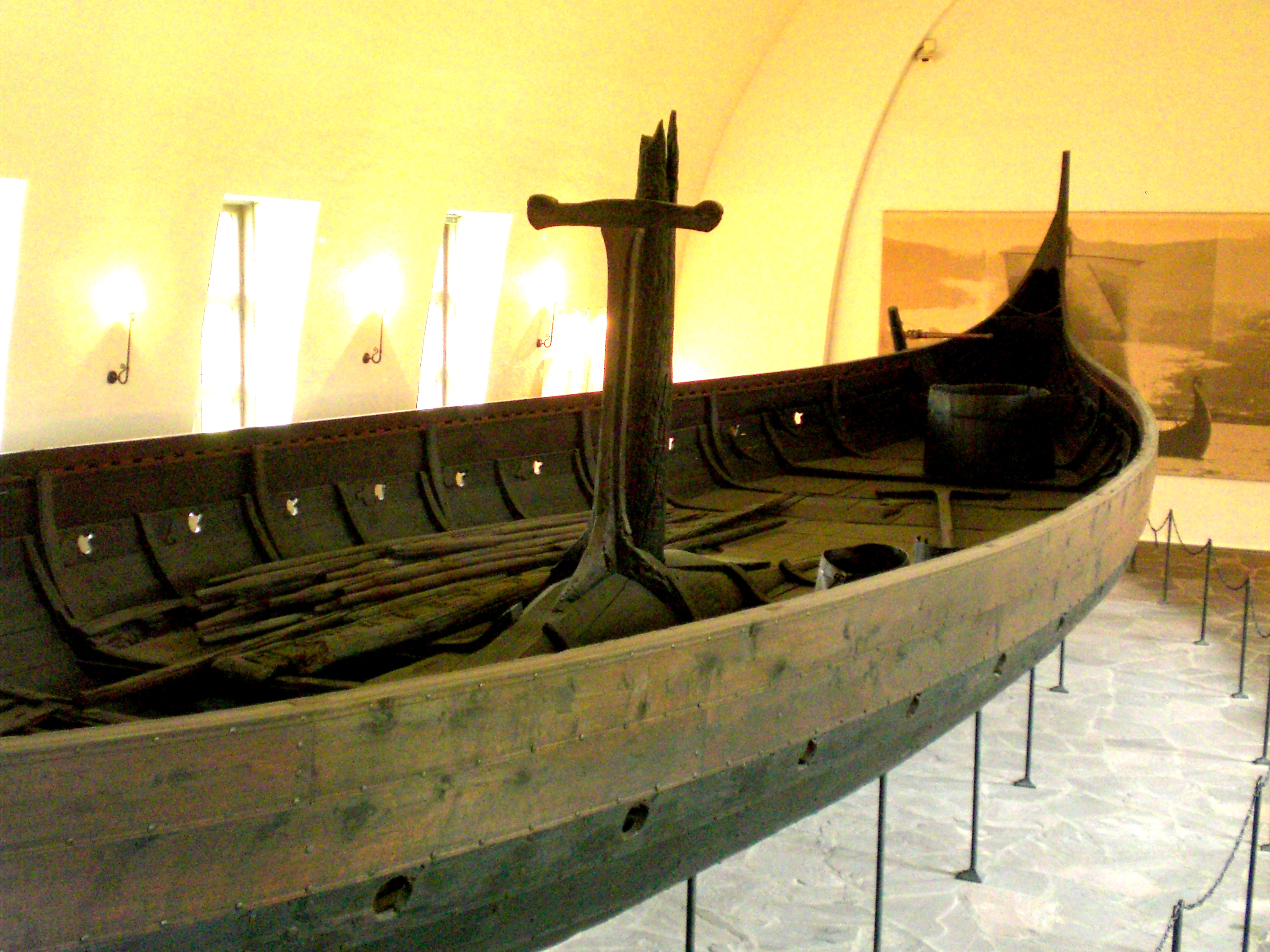 The preserved wooden hull of the Gokstad Viking ship on display in Oslo